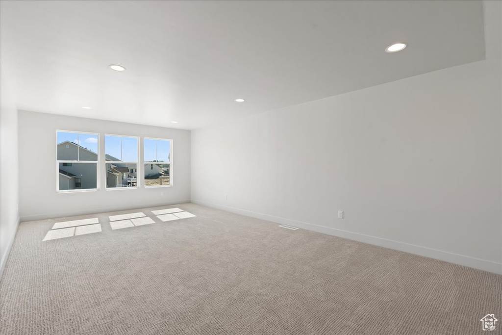 View of carpeted spare room