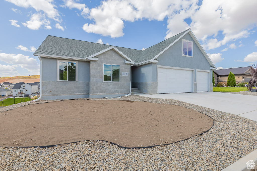 View of front of home with a garage