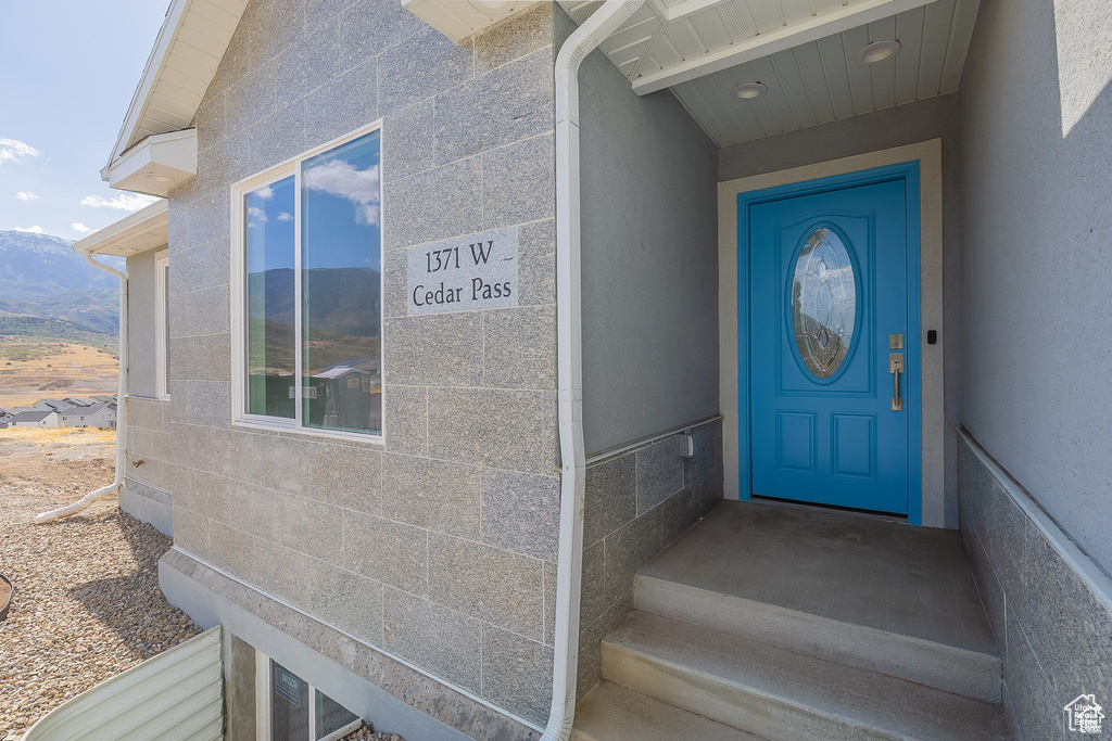 Doorway to property with a mountain view