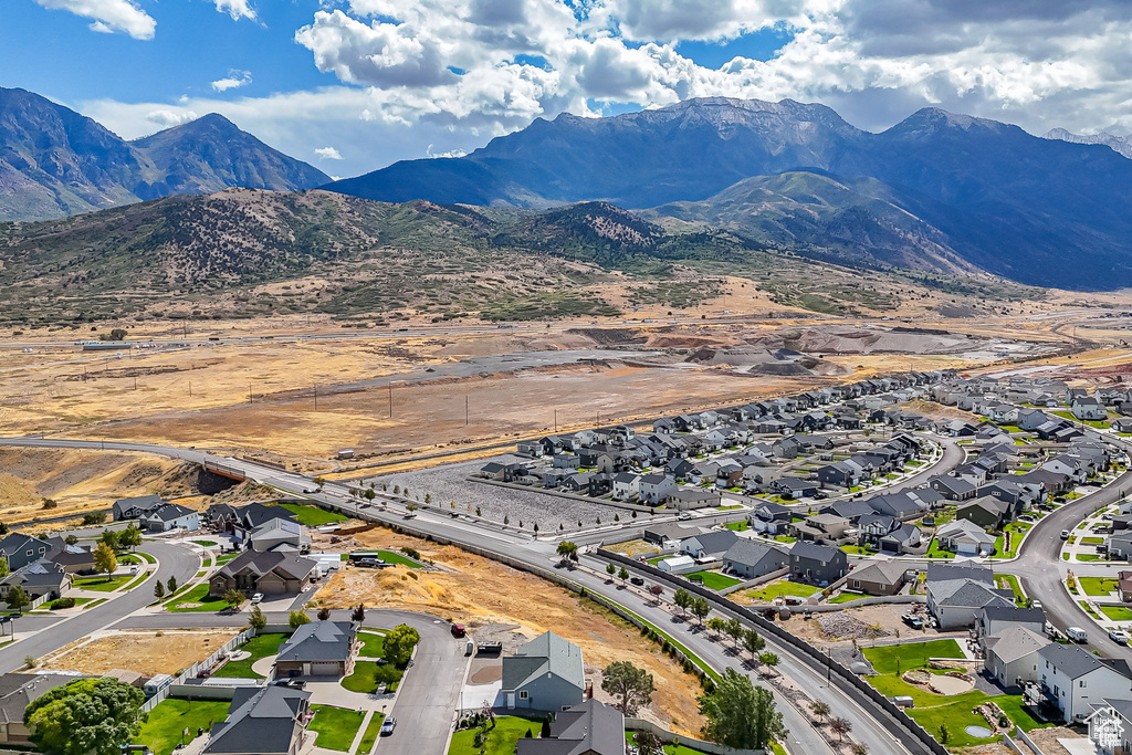 Birds eye view of property with a mountain view