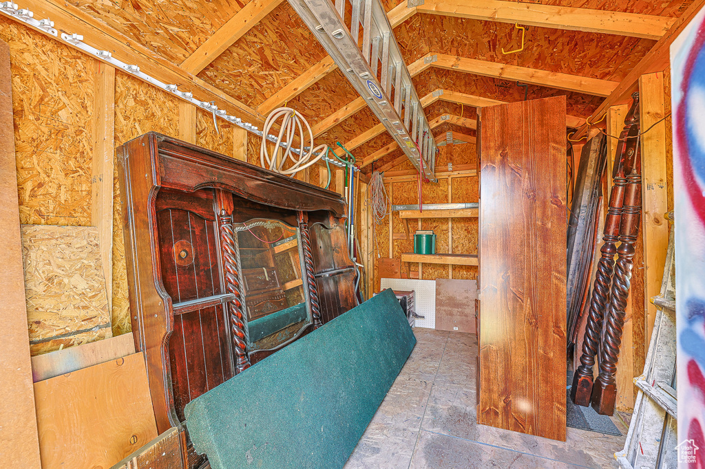 Living room with lofted ceiling