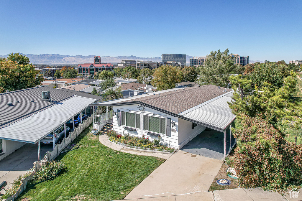 Birds eye view of property with a mountain view