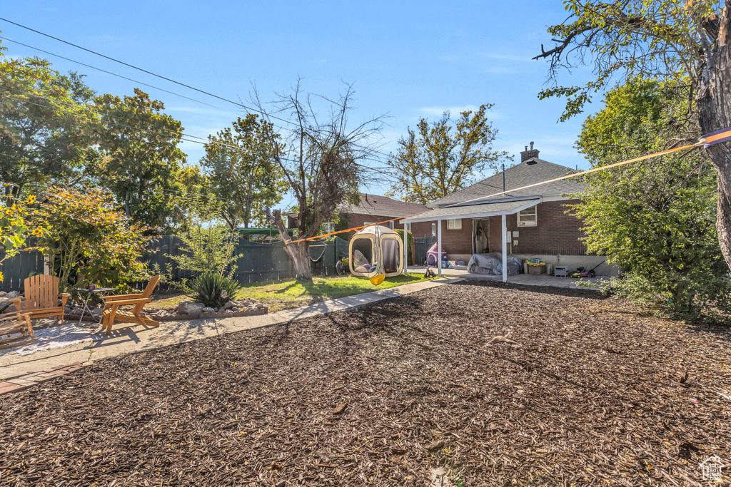 View of yard featuring a patio