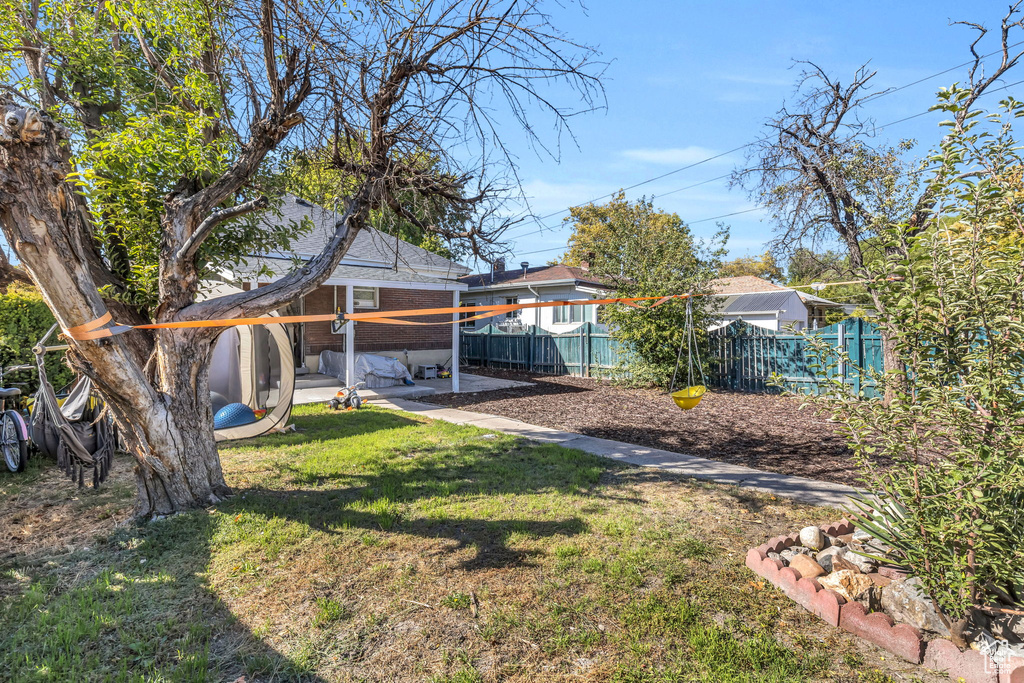 View of yard with a patio