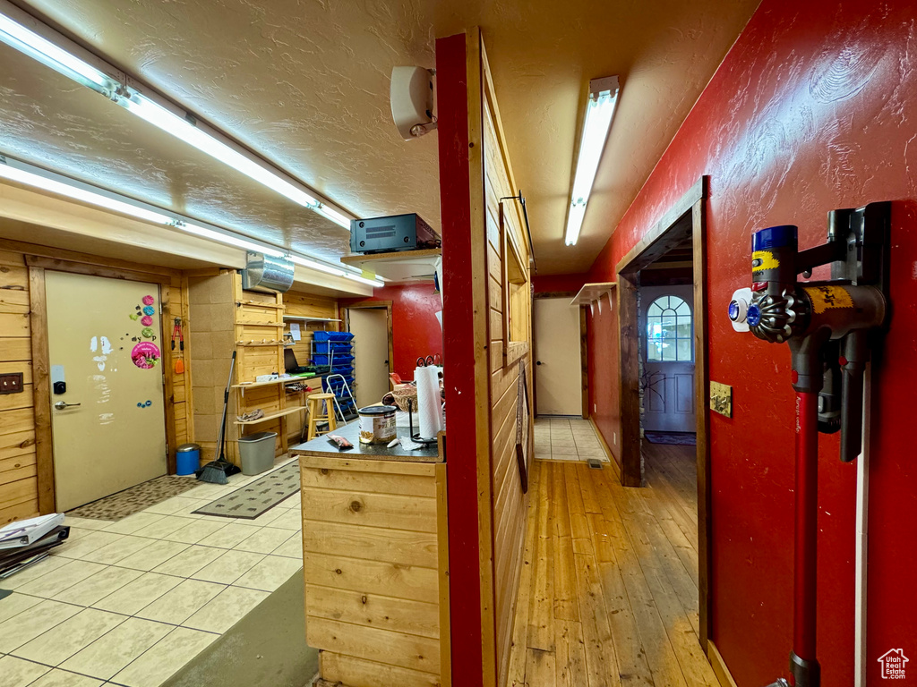 Hallway with light wood-type flooring