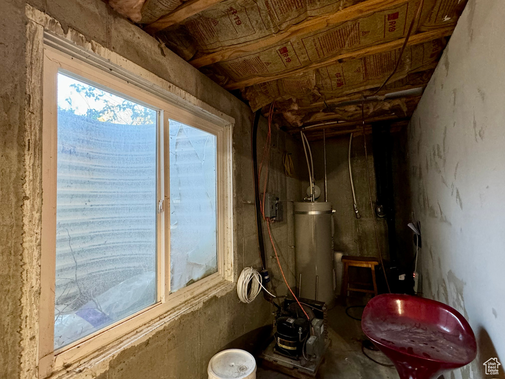 Interior space with strapped water heater