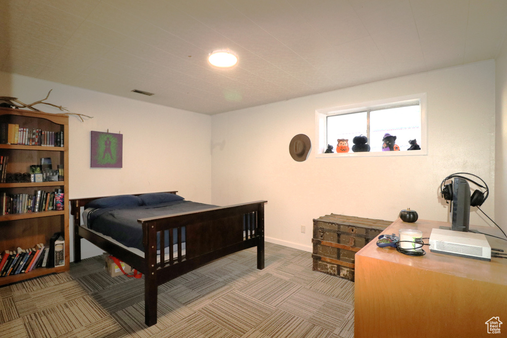 View of carpeted bedroom