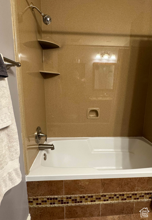 Bathroom featuring tiled shower / bath