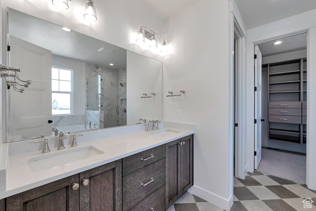 Bathroom with vanity and an enclosed shower