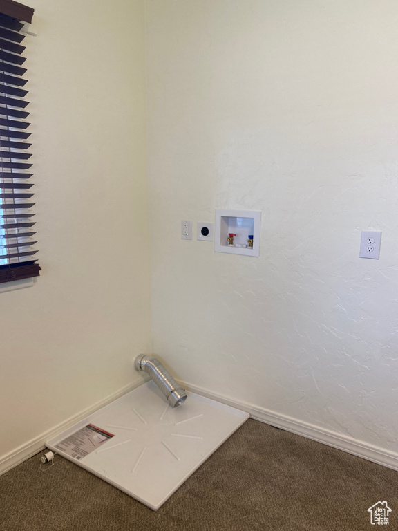 Clothes washing area with washer hookup, hookup for an electric dryer, and carpet floors