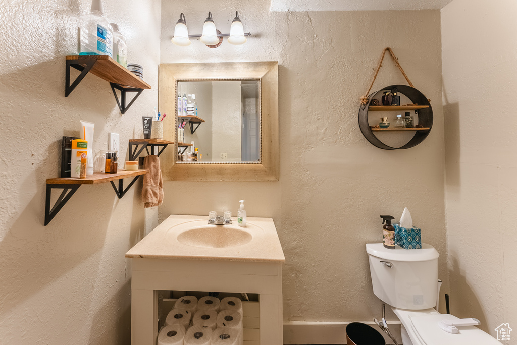 Bathroom with sink and toilet