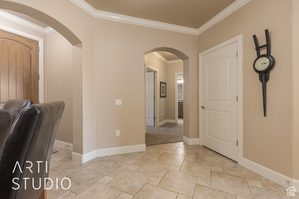 Corridor featuring ornamental molding