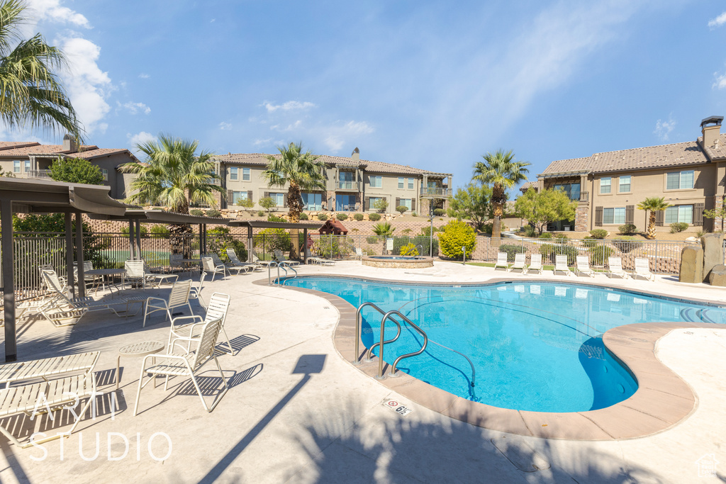 View of swimming pool featuring a patio area