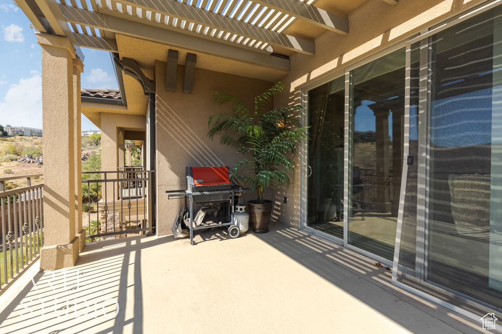 View of patio with a pergola