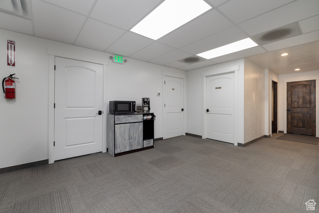 Interior space featuring a paneled ceiling
