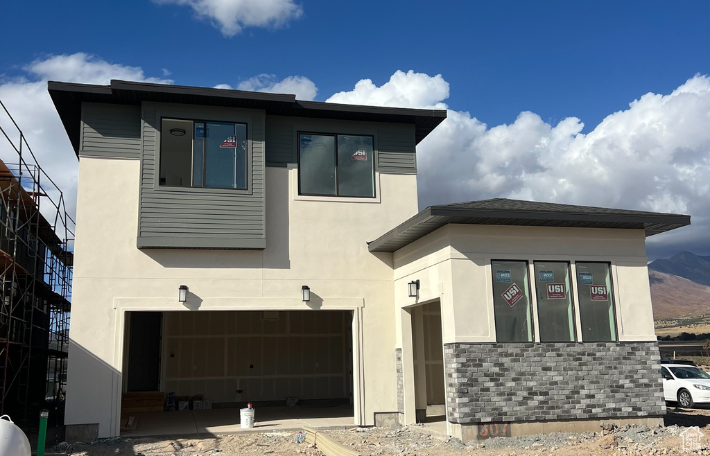 View of front of home with a garage