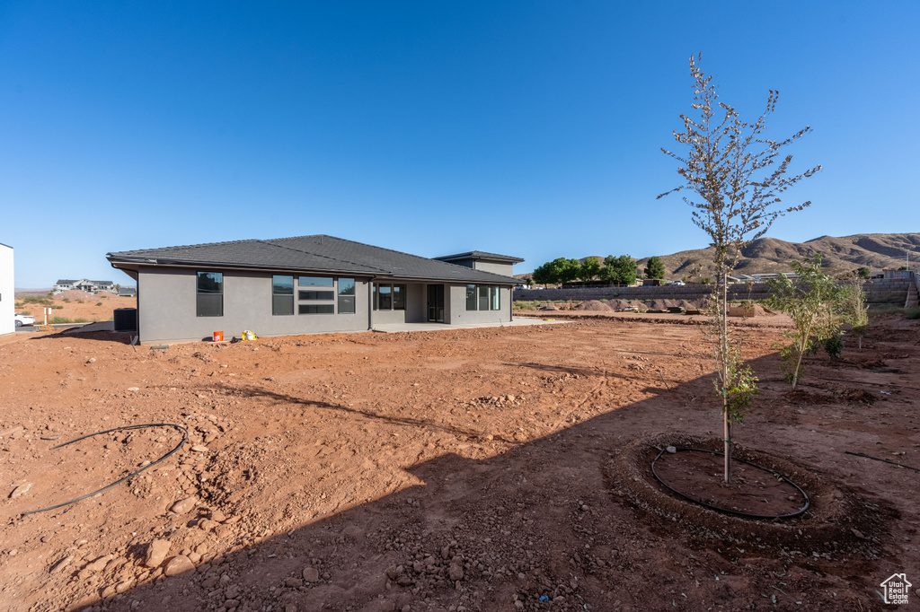 Rear view of house with a mountain view