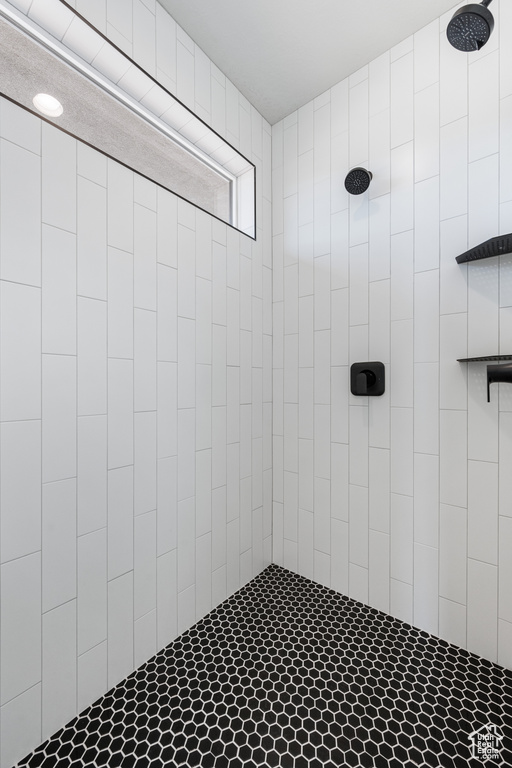 Bathroom with tiled shower