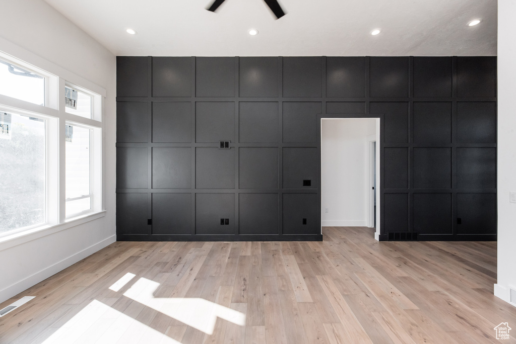 Interior space with light wood-type flooring and ceiling fan