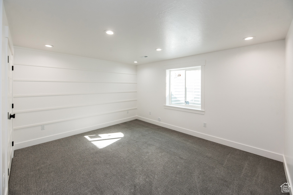 View of carpeted spare room