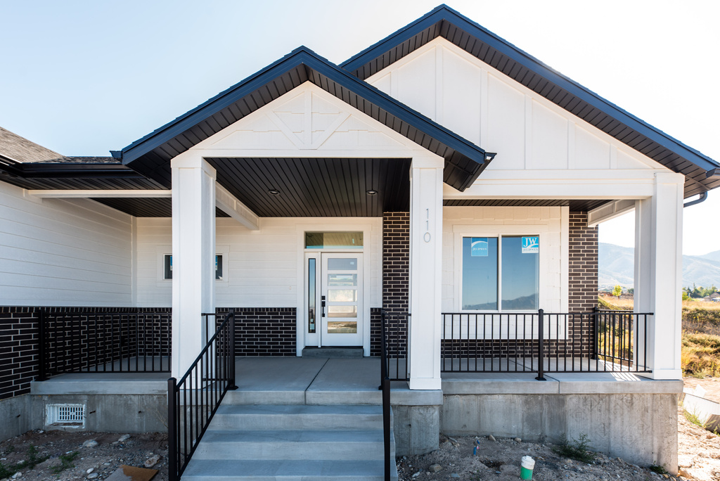 Property entrance with a porch