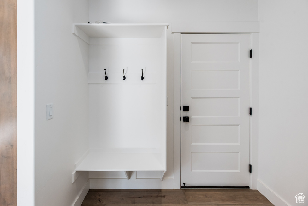 Mudroom with hardwood / wood-style flooring