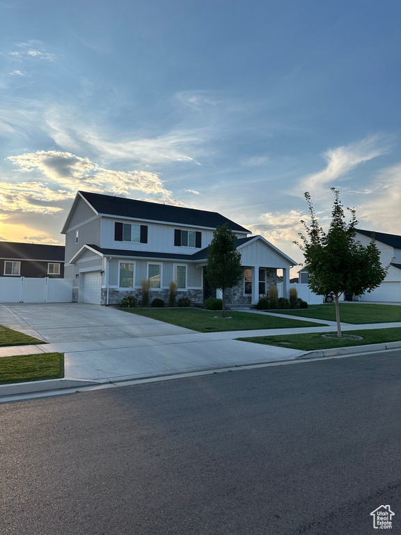 View of front of home with a yard