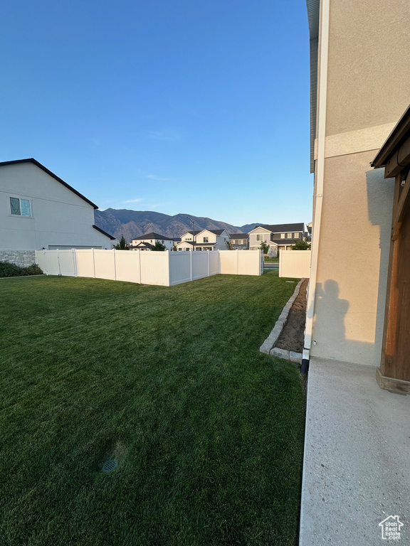 View of yard with a mountain view