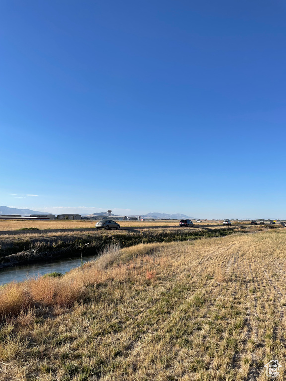 Water view with a rural view