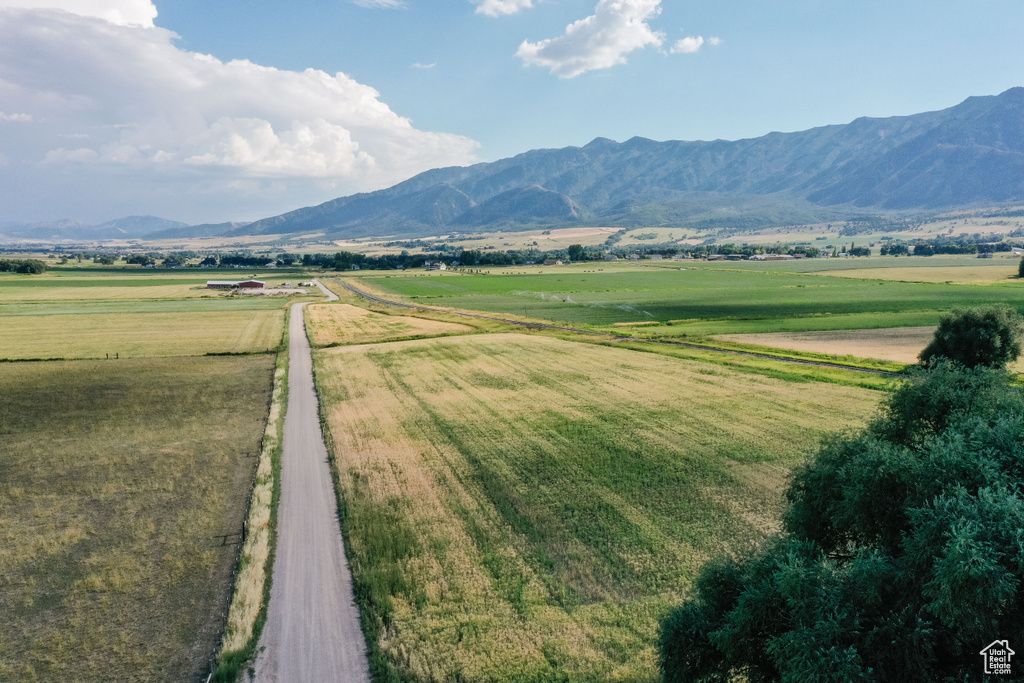 Property view of mountains with a rural view