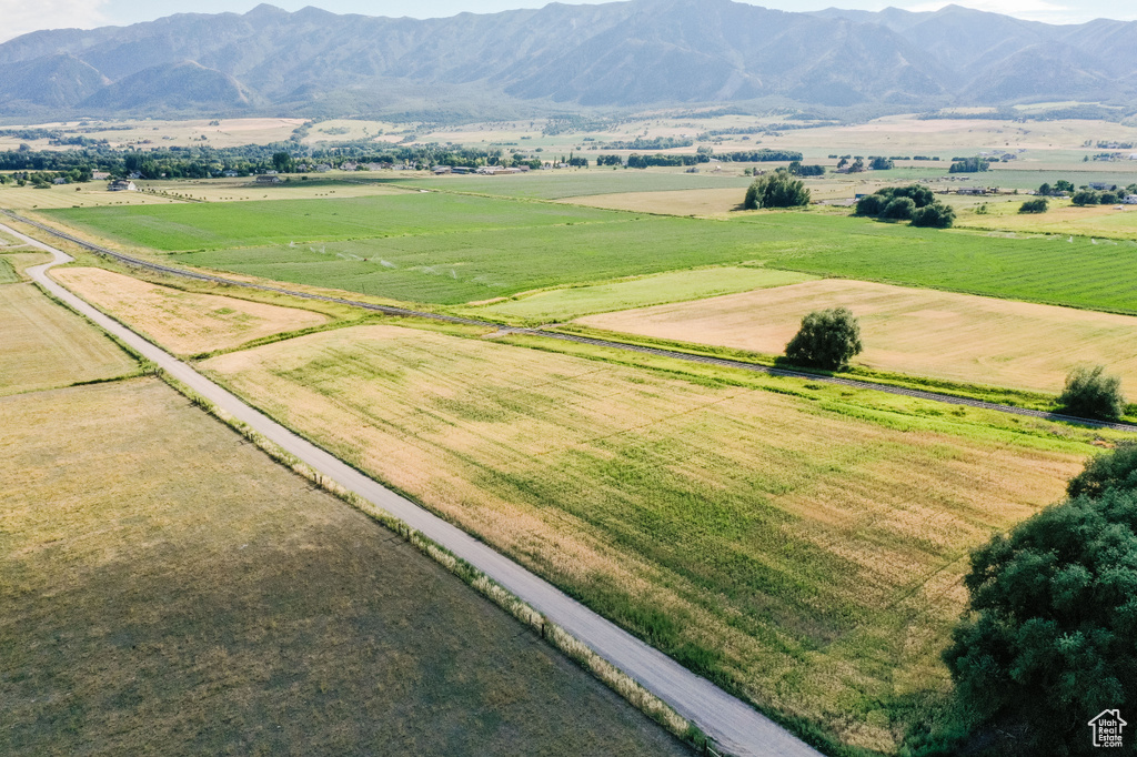 Drone / aerial view with a mountain view and a rural view