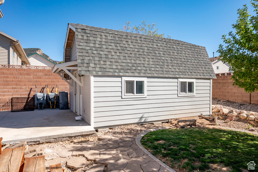 Back of property with a patio area