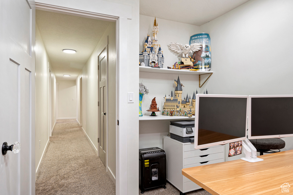 Interior space featuring light colored carpet