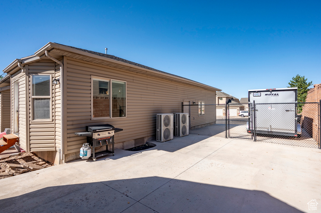 View of home's exterior with ac unit