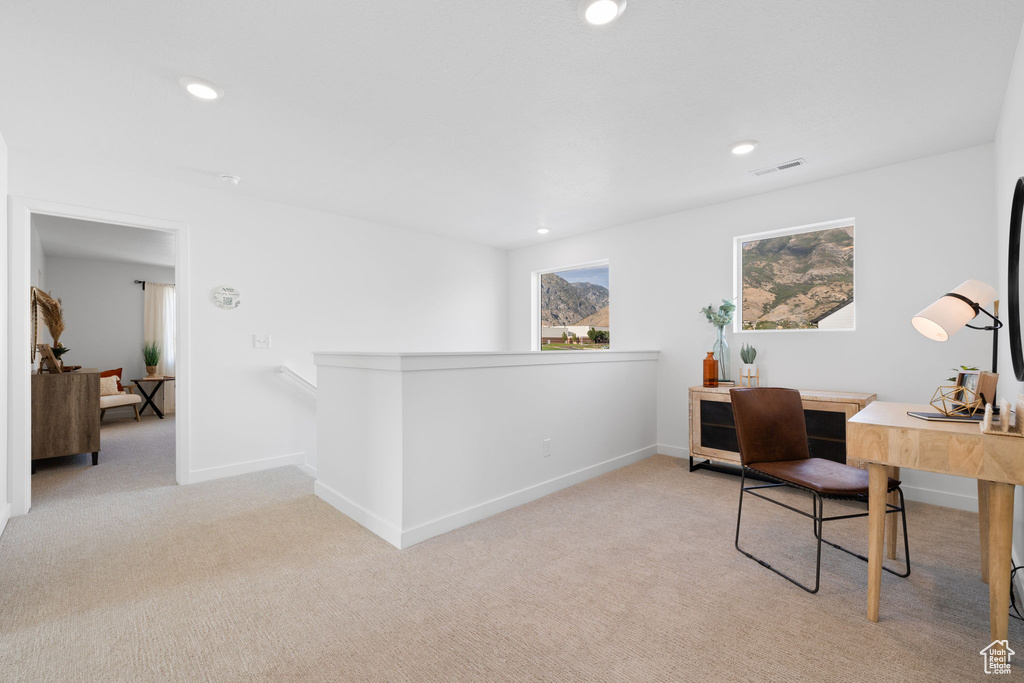 View of carpeted home office