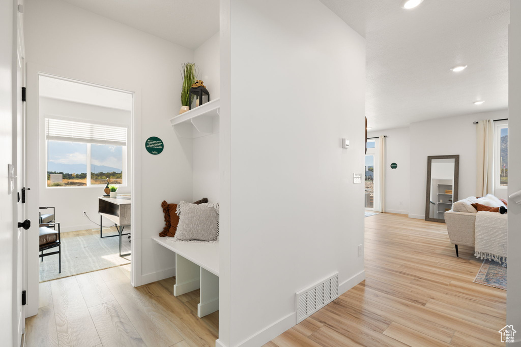 Mudroom with light wood-type flooring