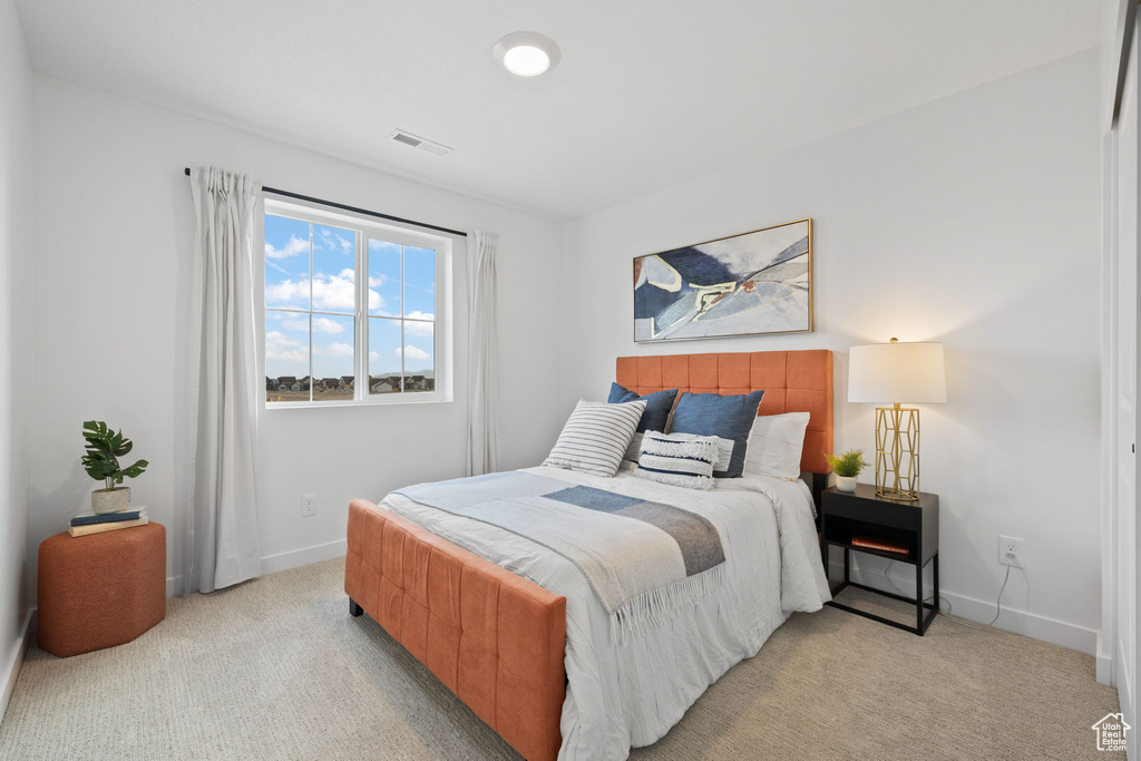 View of carpeted bedroom