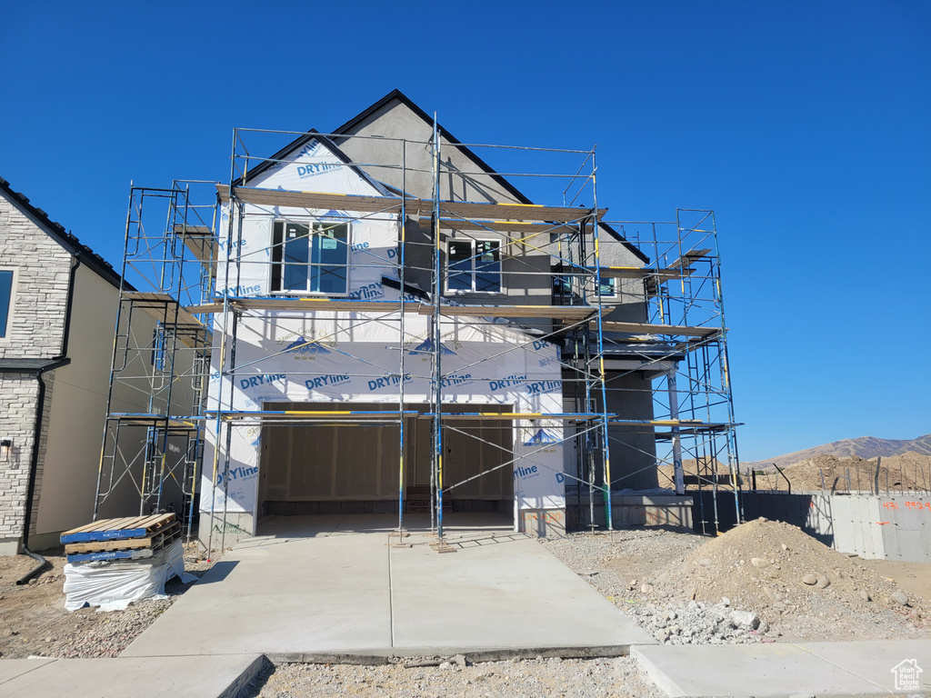 Unfinished property with a mountain view