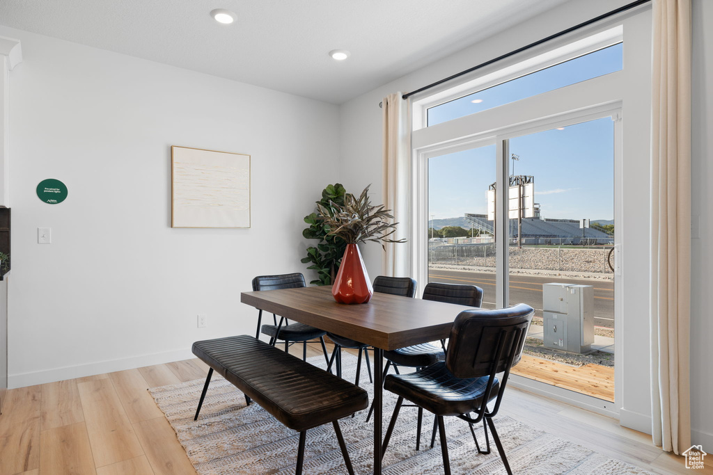 Dining space featuring light hardwood / wood-style flooring