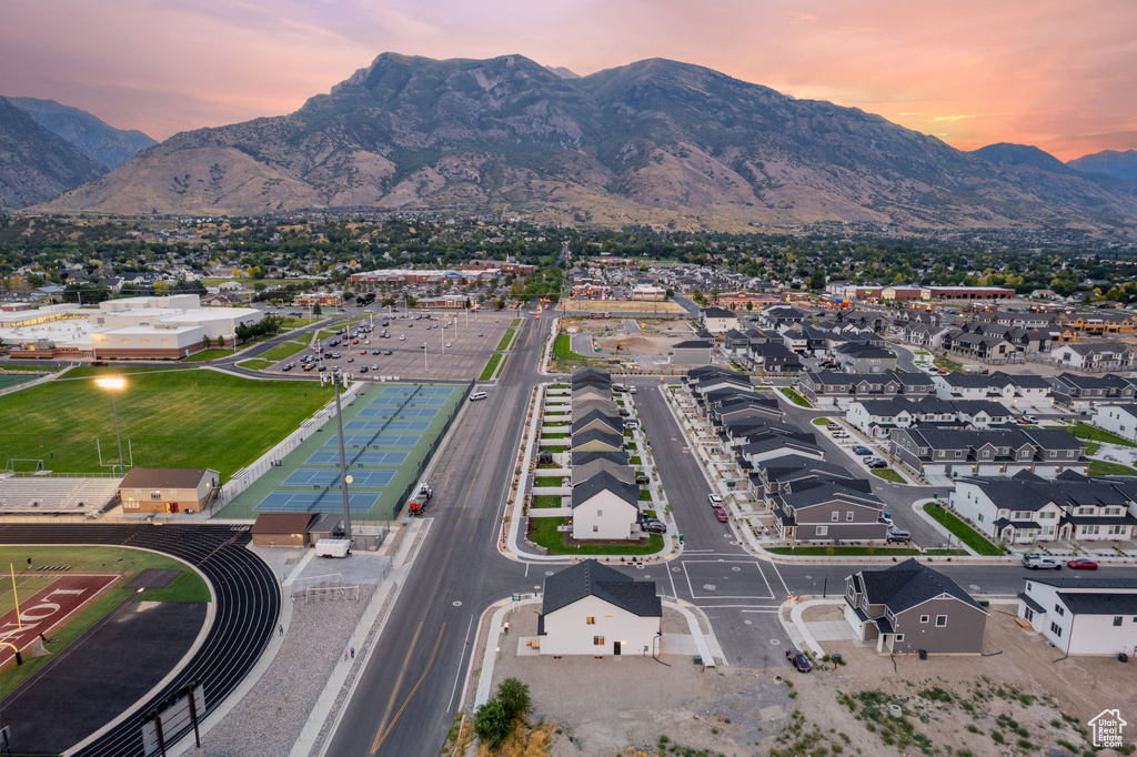 Aerial view at dusk featuring a mountain view