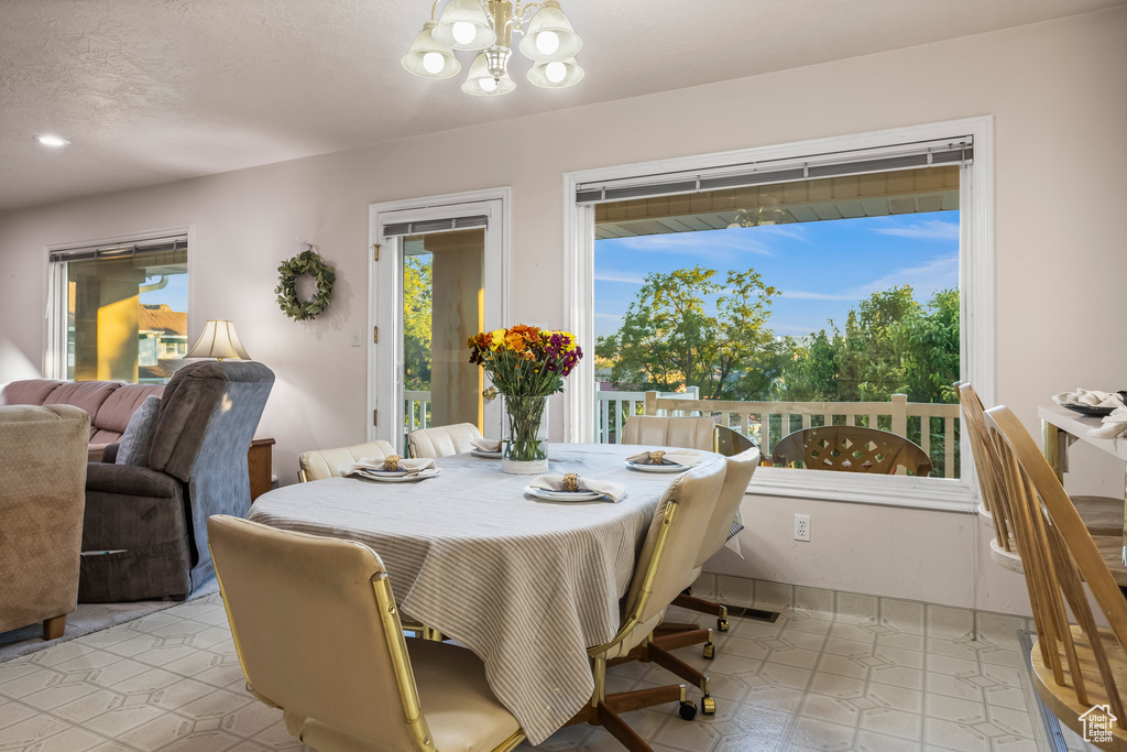 Dining room featuring a notable chandelier