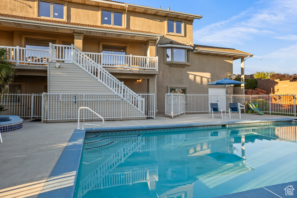 View of pool with a patio area