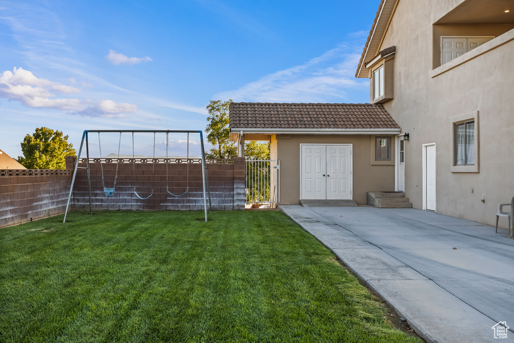 View of yard with a patio