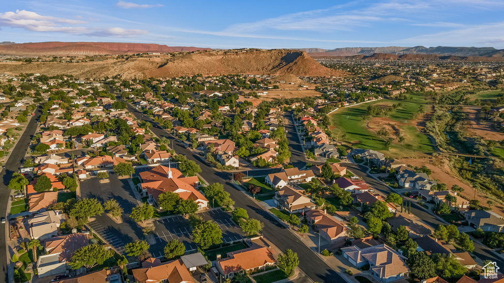 Birds eye view of property featuring a mountain view