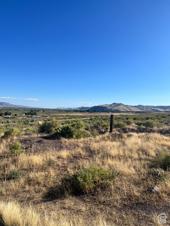 View of mountain feature with a rural view