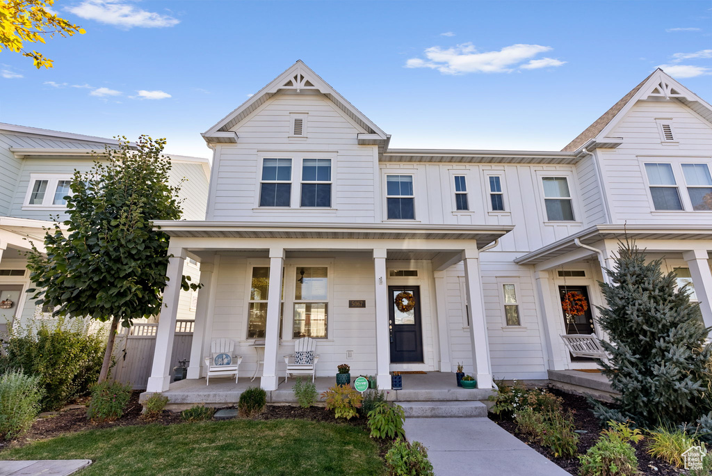 View of front of property with a porch