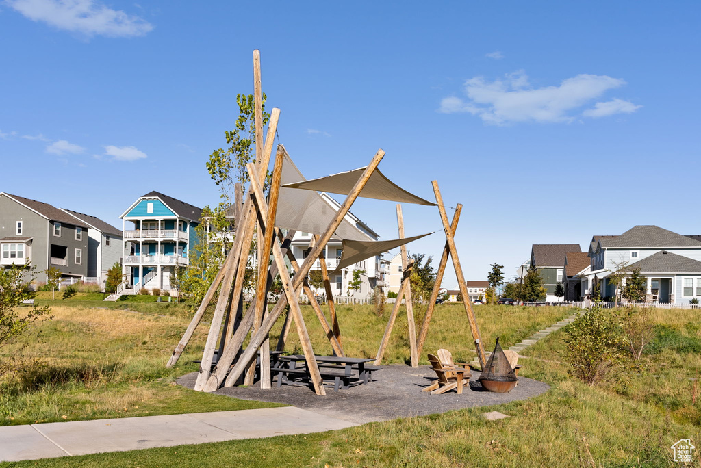 View of play area featuring a fire pit