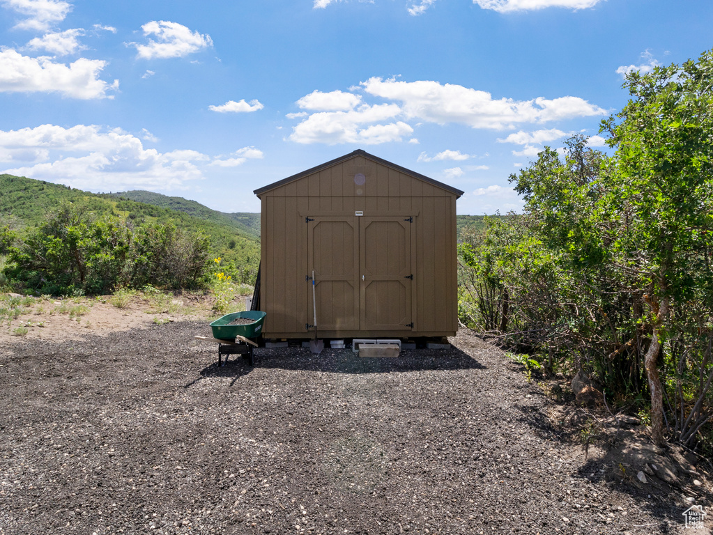 View of outdoor structure featuring a mountain view