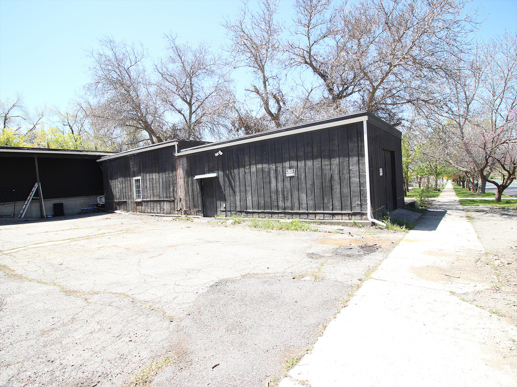 Exterior space featuring a carport