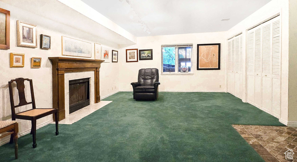 Unfurnished room with dark colored carpet